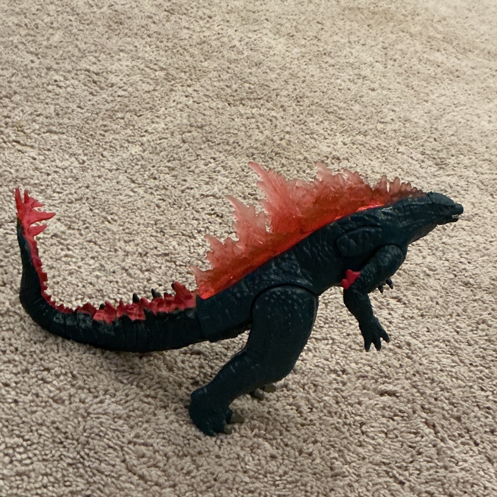 Black and Red Dinosaur Action Figure